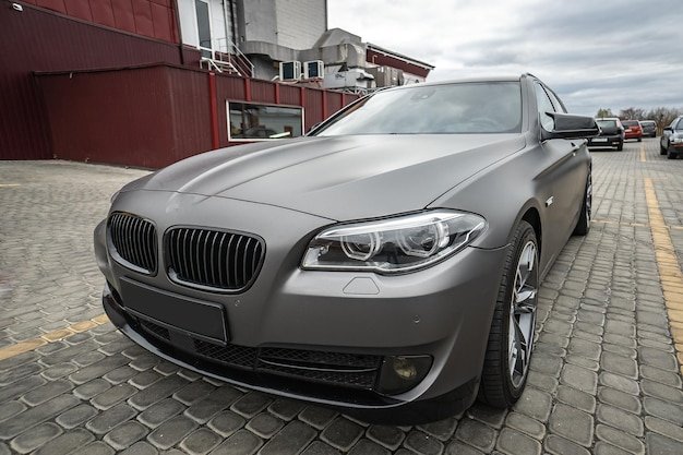 https://img.freepik.com/premium photo/predatory car headlight with blue lights hood powerful grey blue car sports car with matte grey paint wheel with blue disc 308547 3156.jpg